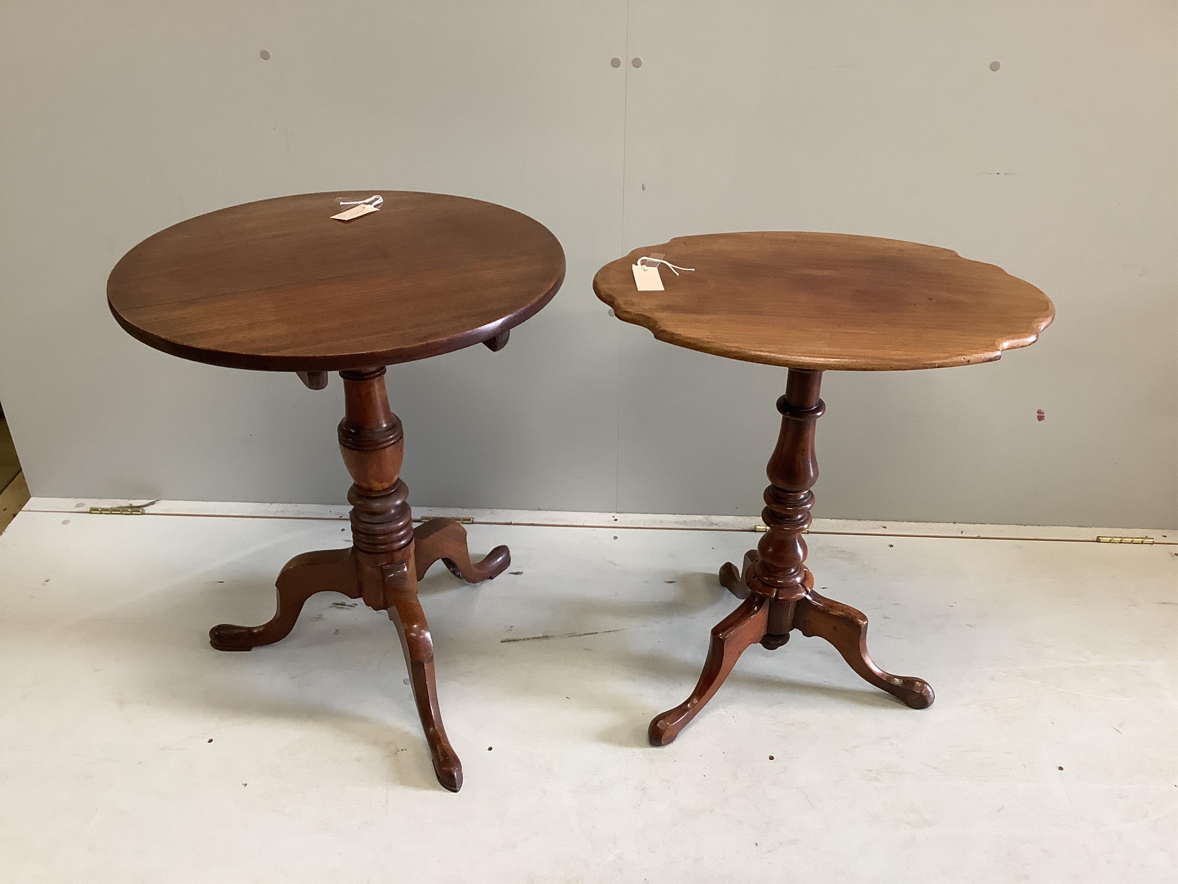 An early Victorian oval mahogany tripod wine table, width 60cm, depth 43cm, height 71cm, together with a 19th century circular mahogany tea table. Condition - fair